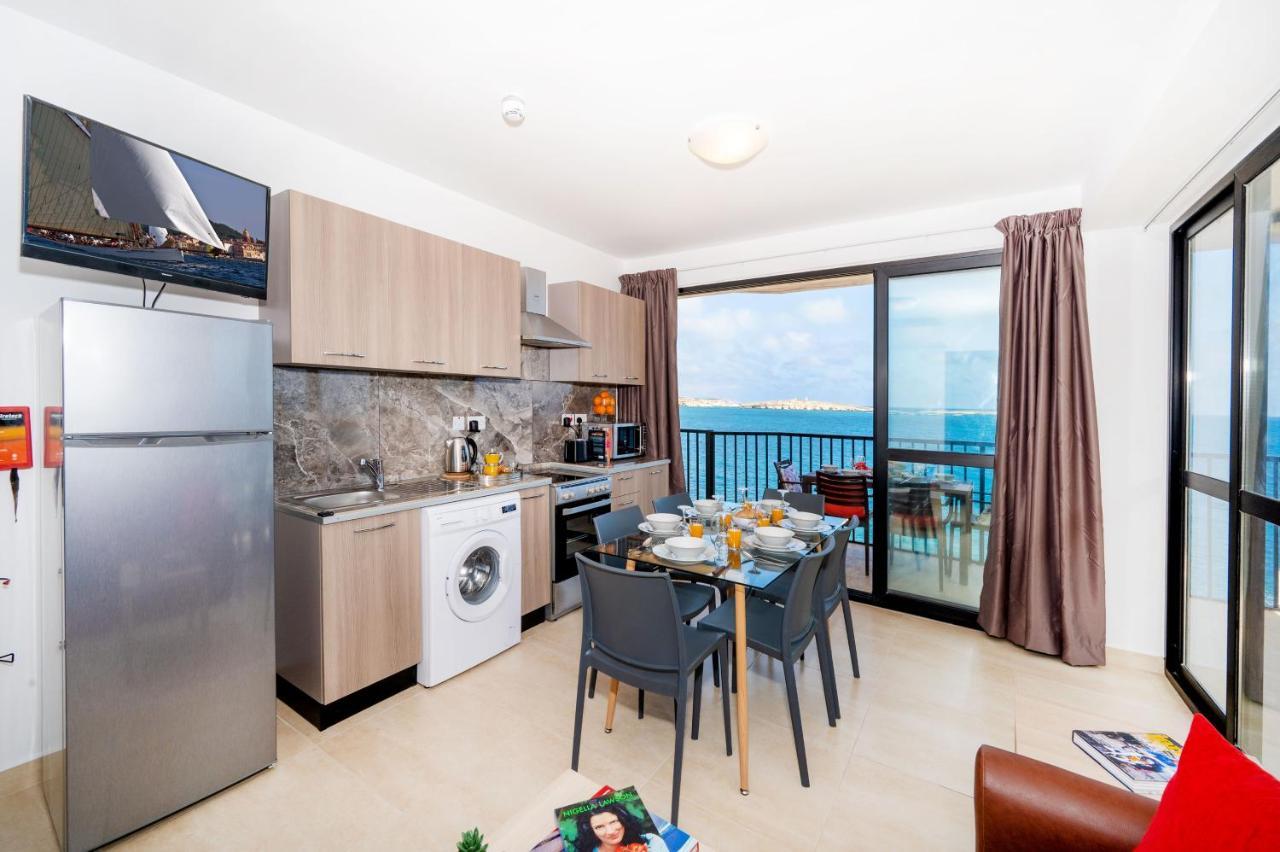 Islet Promenade Seafront Apartment With Large Corner Terrace By Getawaysmalta St. Paul's Bay Bagian luar foto