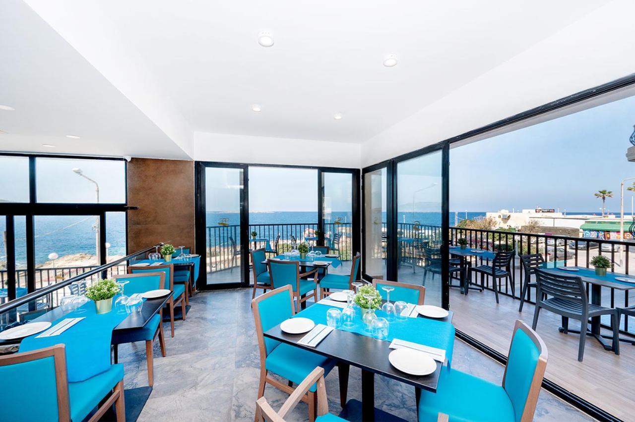 Islet Promenade Seafront Apartment With Large Corner Terrace By Getawaysmalta St. Paul's Bay Bagian luar foto